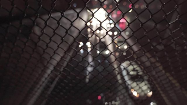 Out of Focus Slow Traffic on Highway Under Heavy Rain, Focus on Fence,