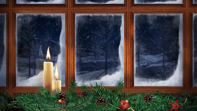 Christmas Window Snowing Outside 4K Loop features a window with frost on the glass and two candles flickering with snow falling outside in a loop