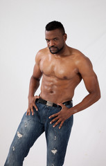 Serious Black man with his shirt off