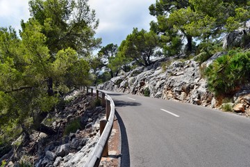 Open coastal road winding through to lighthouse Cap Formentor