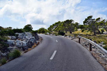Open coastal road winding through to lighthouse Cap Formentor