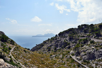 Open coastal road winding through to lighthouse Cap Formentor