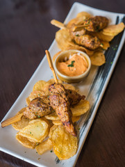 Pork skewer with creamy garlic sauce