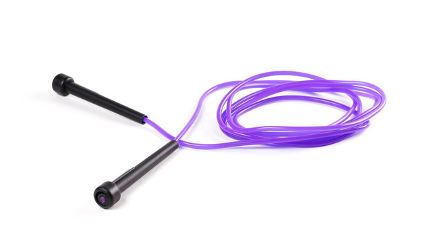 Purple jump rope. Close up. Isolated on white background