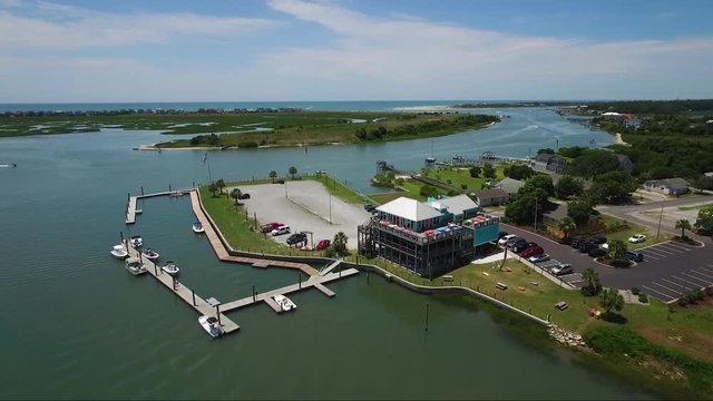 Drone Shot Of Intracoastal Waterway On Sunny Day Near Ocean Isle Beach NC Near Shallotte NC