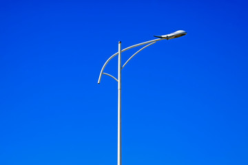 street lamp under the blue sky