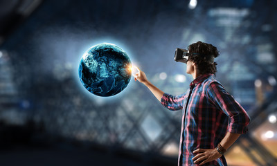 Experiencing virtual technology world. Mixed media