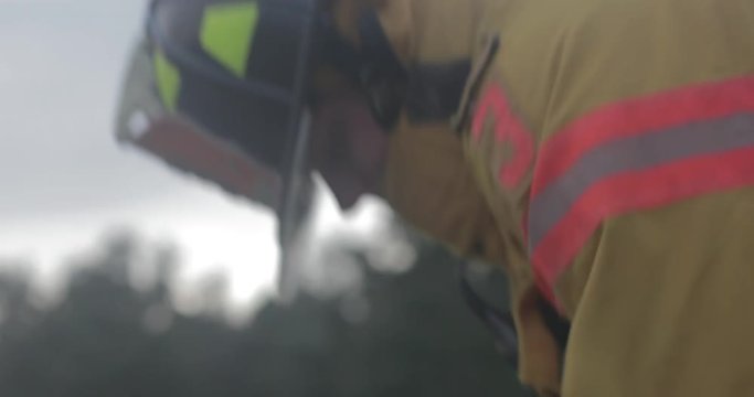 Firefighter working on fire hydrant