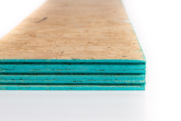 Sub flooring boards made of wood chips isolated on a white with copy space.