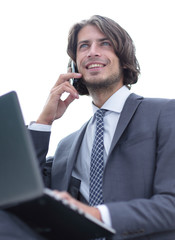 closeup.serious businesswoman talking on the smartphone