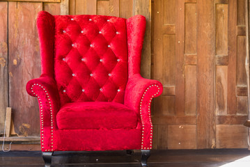 Red vintage sofa decoration interior.