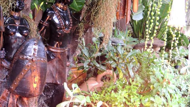 clay statues in natures elements of earth wind fire and water.