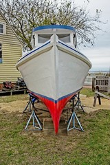 boat resting on jack stands