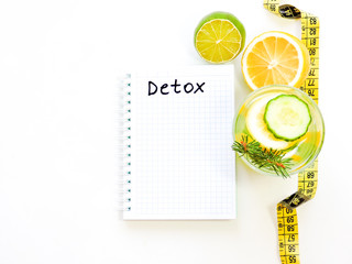 Food for fitness, healthy lifestyle frame flat lay with cucumber and lemon. With space for your text.Infused detox water with cucumber, lemon. cucumber and lemon water.Slimming and excretion of slag. 