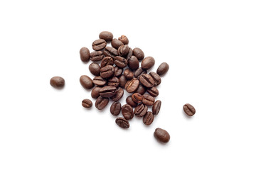 Roasted coffee beans isolated on white background. Close-up.