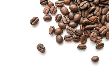 Roasted coffee beans isolated on white background. Close-up.