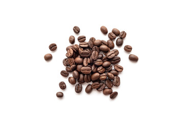 Roasted coffee beans isolated on white background. Close-up.
