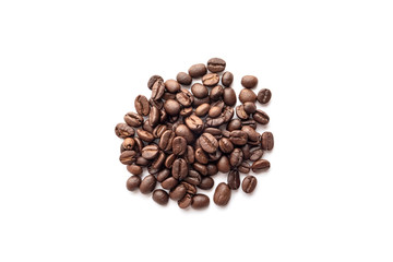 Roasted coffee beans isolated on white background. Close-up.