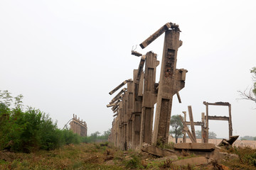Fototapeta na wymiar Broken workshop framework, Tangshan earthquake museum, China