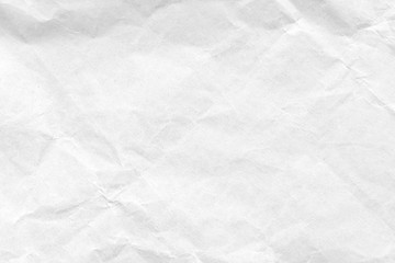 Obraz premium White crumpled paper texture background. Close-up.