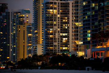 Fototapeta na wymiar Modern Buildings at Night, Sunny Isles Beach. Close up view.