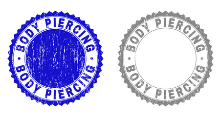 Grunge BODY PIERCING stamp seals isolated on a white background. Rosette seals with distress texture in blue and gray colors. Vector rubber imitation of BODY PIERCING title inside round rosette.