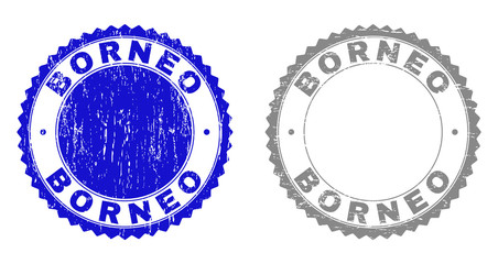 Grunge BORNEO stamp seals isolated on a white background. Rosette seals with grunge texture in blue and gray colors. Vector rubber imitation of BORNEO title inside round rosette.