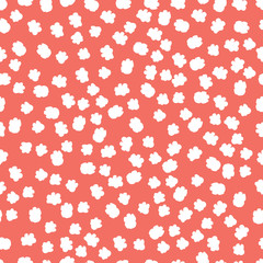 Seamless floral pattern background in trendy color of 2019, living coral, endless hand drawing abstract doodle of falling bloom flowers with petals. Vector.