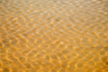 Fototapeta na wymiar Water of the sea with sun reflections