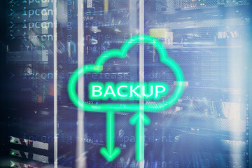 Backup button on modern server room background. Data loss prevention. System recovery.