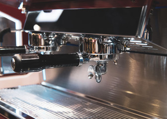 Espresso shot from coffee machine in coffee shop,Coffee maker in coffee shop