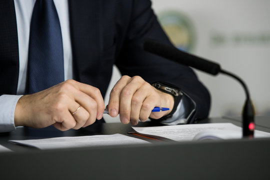 Press interview. Hand gesture. Businessman or politician.
