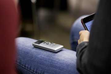 a voice recorder in the hand of a journalist