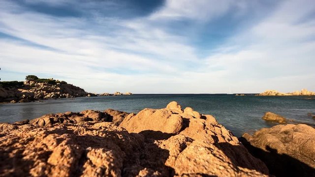 a time lapse shot of the sinking sun atin sardinia in summer with view over the sea