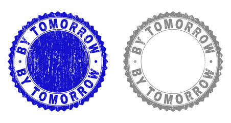 Obraz premium Grunge BY TOMORROW stamp seals isolated on a white background. Rosette seals with grunge texture in blue and gray colors. Vector rubber overlay of BY TOMORROW tag inside round rosette.