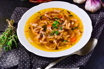 Traditional tripe soup in polish style with beef and vegetables