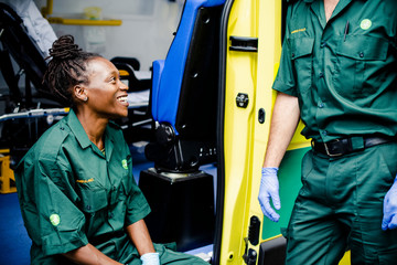 Paramedics team with an ambulance