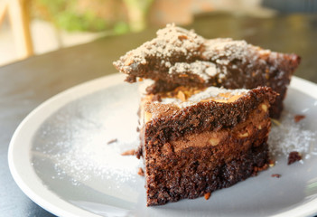 brownies cake on the table / piece of chocolate cake cocoa with nut on top view brownies slice