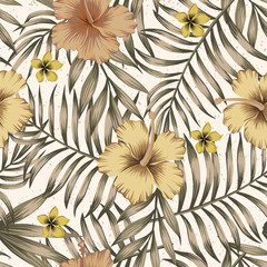 Brown tropical leaves golden hibiscus beige background © berry2046