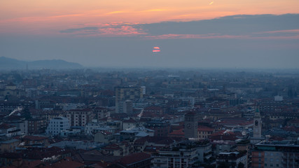 Bergamo, Italy. Landscape to the new city (downtown) at the sunrise from the old town located on the top of the hill