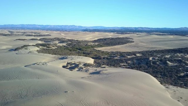 Incredible aerial drone view of Oceano Dunes, located on the Central Coast of California, Santa Barbara County