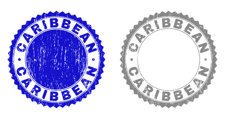 Grunge CARIBBEAN stamp seals isolated on a white background. Rosette seals with grunge texture in blue and gray colors. Vector rubber imitation of CARIBBEAN tag inside round rosette.