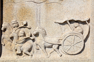 Rock carving ancient Horse and cart