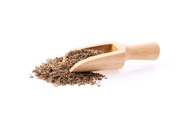 Cumin seeds on white background