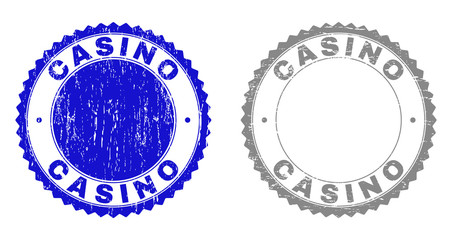 Grunge CASINO stamp seals isolated on a white background. Rosette seals with distress texture in blue and gray colors. Vector rubber imitation of CASINO tag inside round rosette.