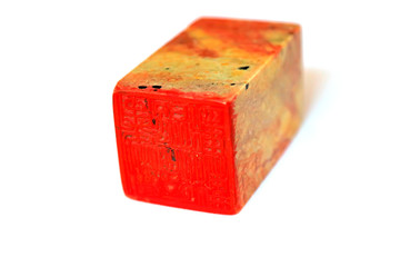 gold stone seal in the white background