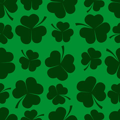 Seamless texture with clover leaves.