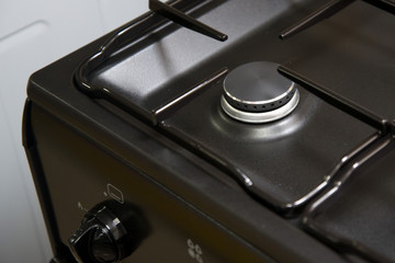 Gas burner new stove. Close-up.