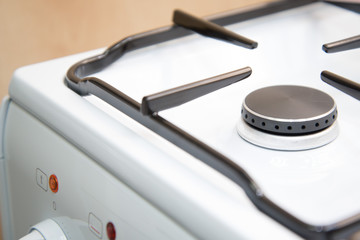 Gas burner new stove. Close-up.