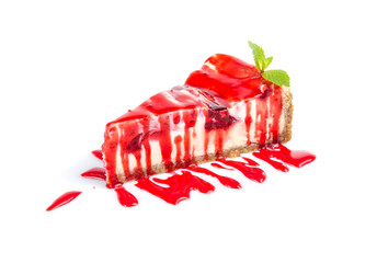 piece of cheese cake with cherry jam topping isolated on white background